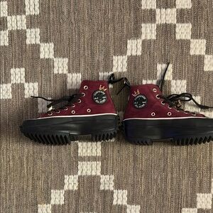 Converse Burgundy Platform Sneakers can fit a women size 6:)